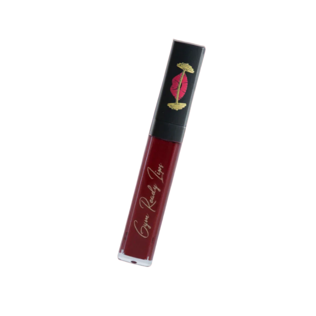 Red lip gloss tube with black cap on white background