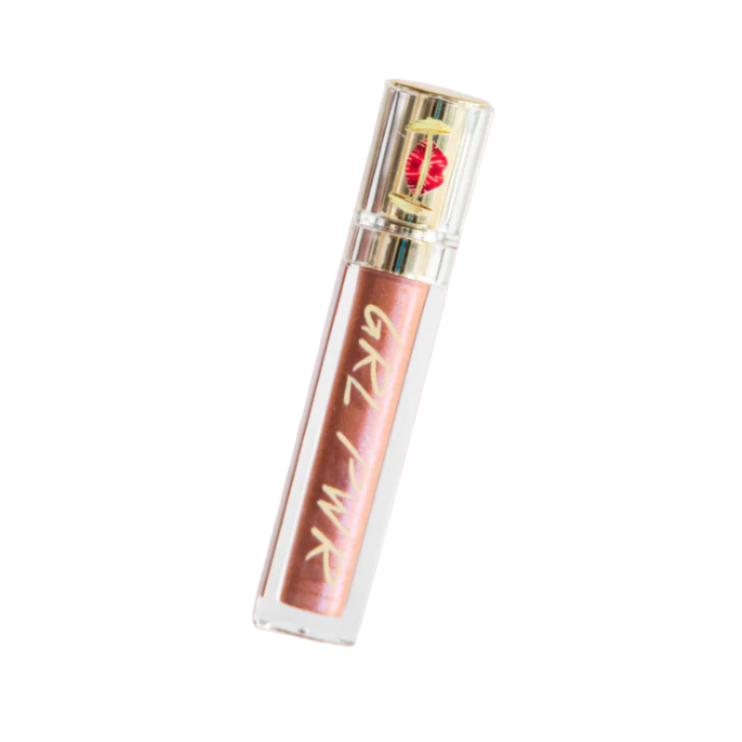 Lip gloss tube with gold and pink design on a white background