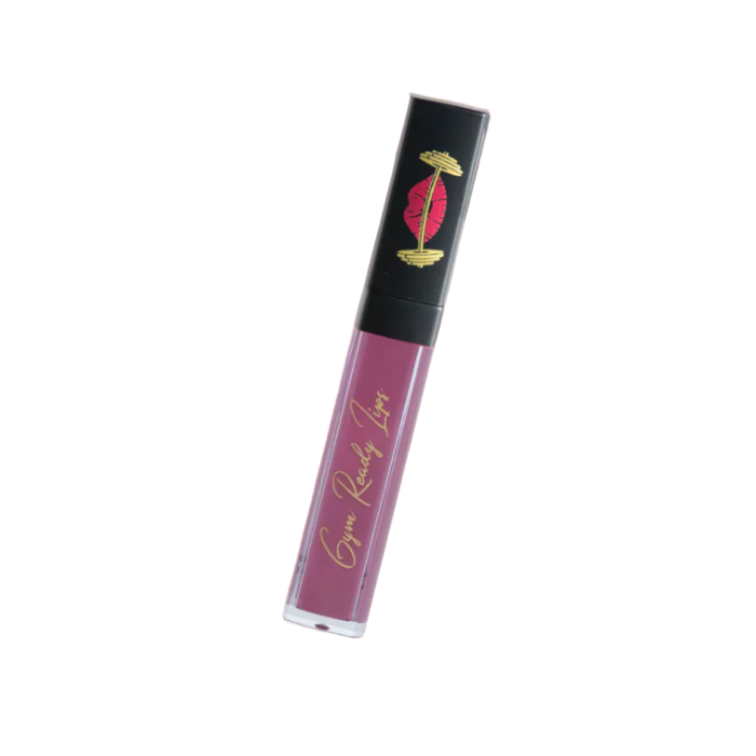 Lip gloss tube with pink color and black cap on white background
