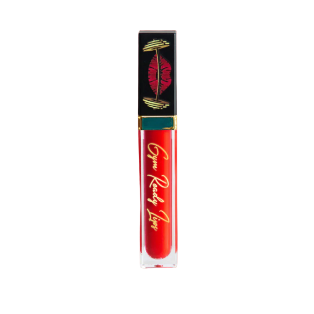 Red lip gloss tube with black and gold packaging on a white background