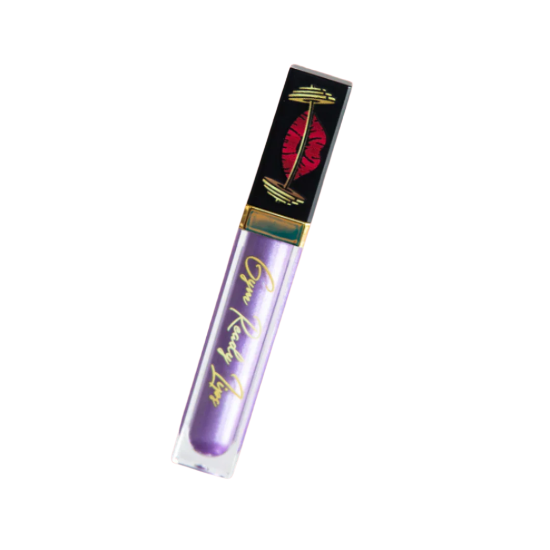 Lip gloss tube with purple case and black cap on white background