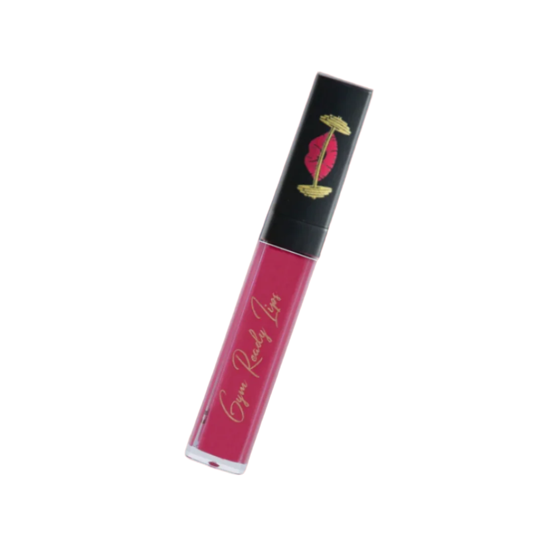 Pink lip gloss tube with black cap on white background