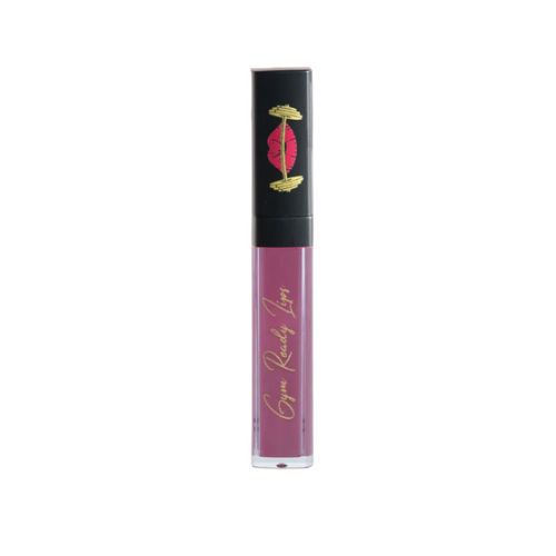 Lip gloss tube with purple body and black lid on white background
