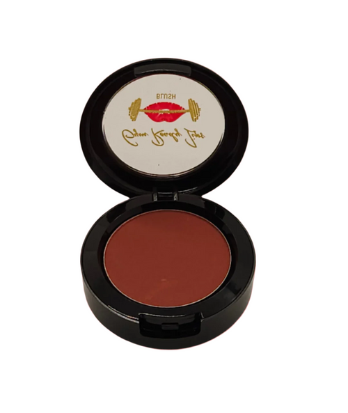 Makeup compact with brown powder on a white background